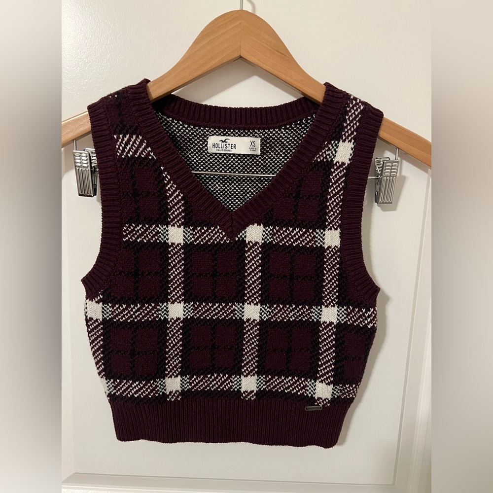 Hollister dark red, black, and white vest from women’s size xsmall